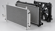 Automotive condenser, radiator and electric cooling fan arranged in order to show the front heat-exchanger airflow path.